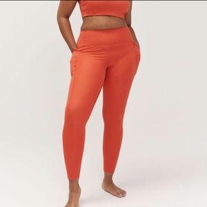 Girlfriend Collective red orange compressive pocket leggings size XL